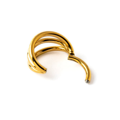 Gold Trinity surgical steel clicker septum with three rings closure view