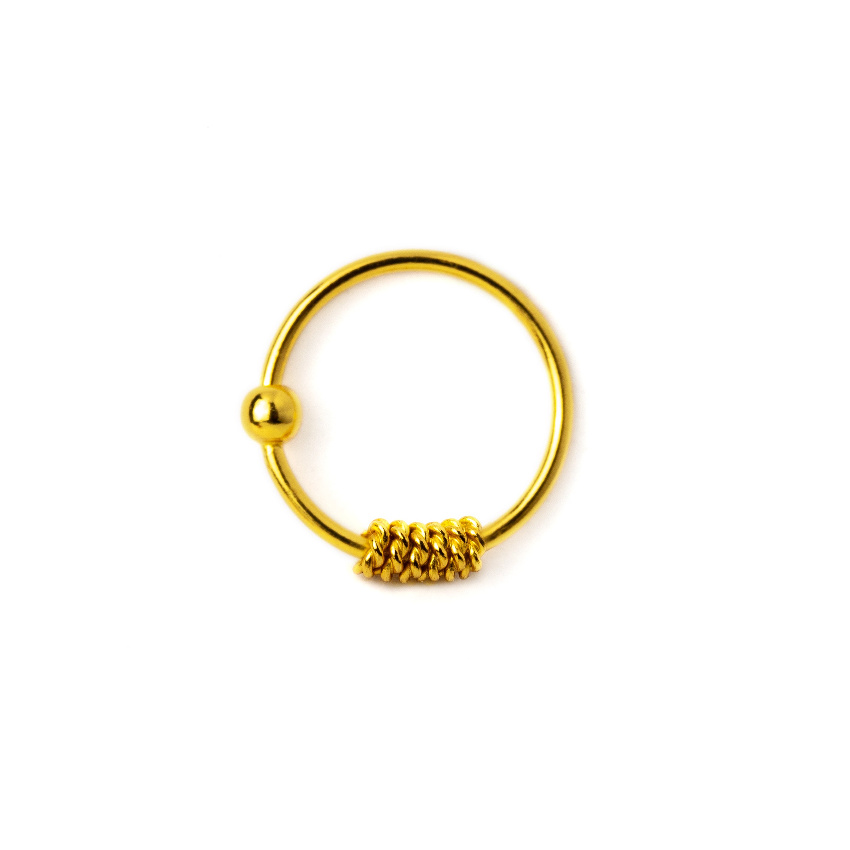 Gold coiled nose ring frontal view
