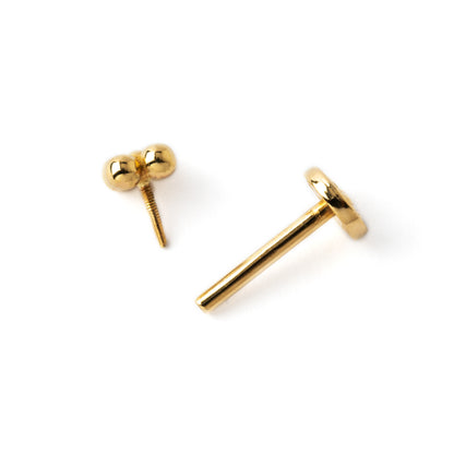 14k Gold internally threaded screw back earring 1.2mm (16g), 8mm, dots flower labret stud closure view
