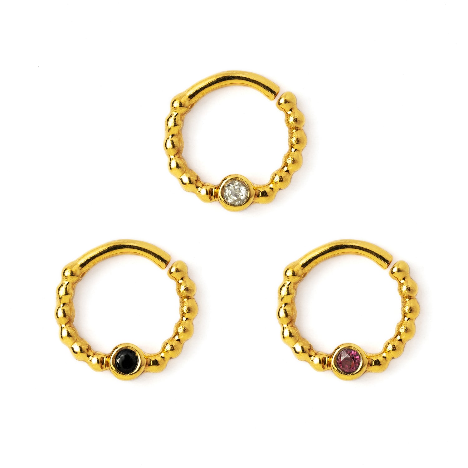 gold dotted septum ring with Black Spinal, Ruby &amp; Topaz gemstones frontal view