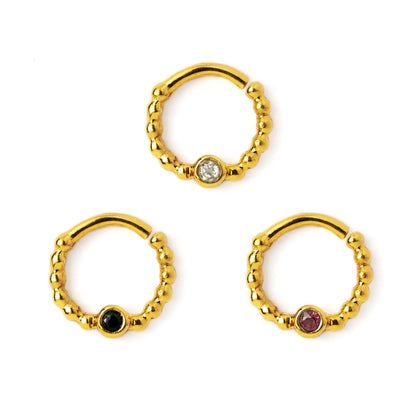gold dotted septum ring with Black Spinal, Ruby &amp; Topaz gemstones right side view