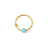 18k Gold nose ring with blue Opal bead frontal view