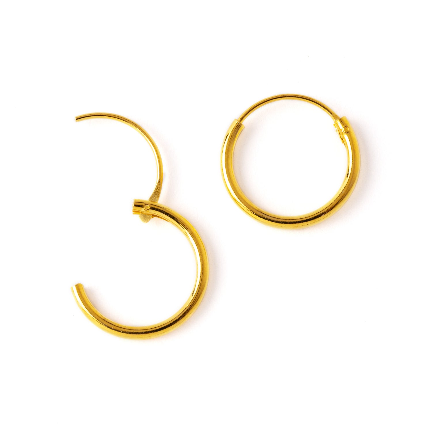 Gold thin hoop earrings open closure view