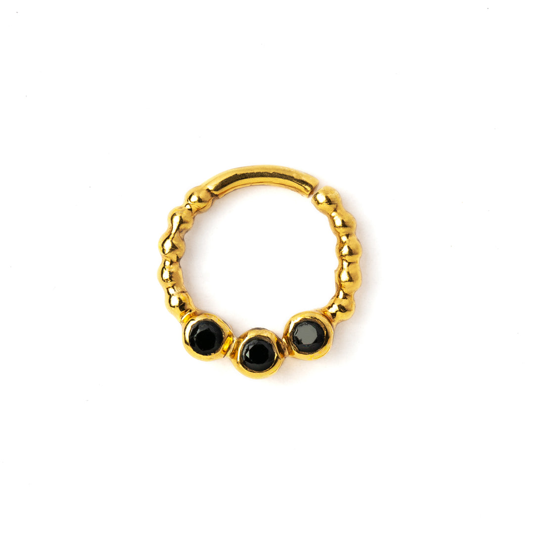 gold dotted septum ring with three Black Spinal gemstones frontal view
