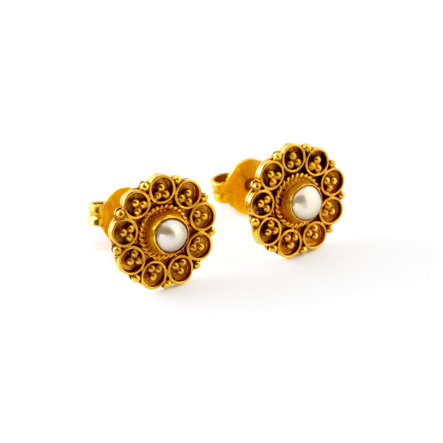 pair of antique Indian gold stud earrings flower shaped with centred pearl front view