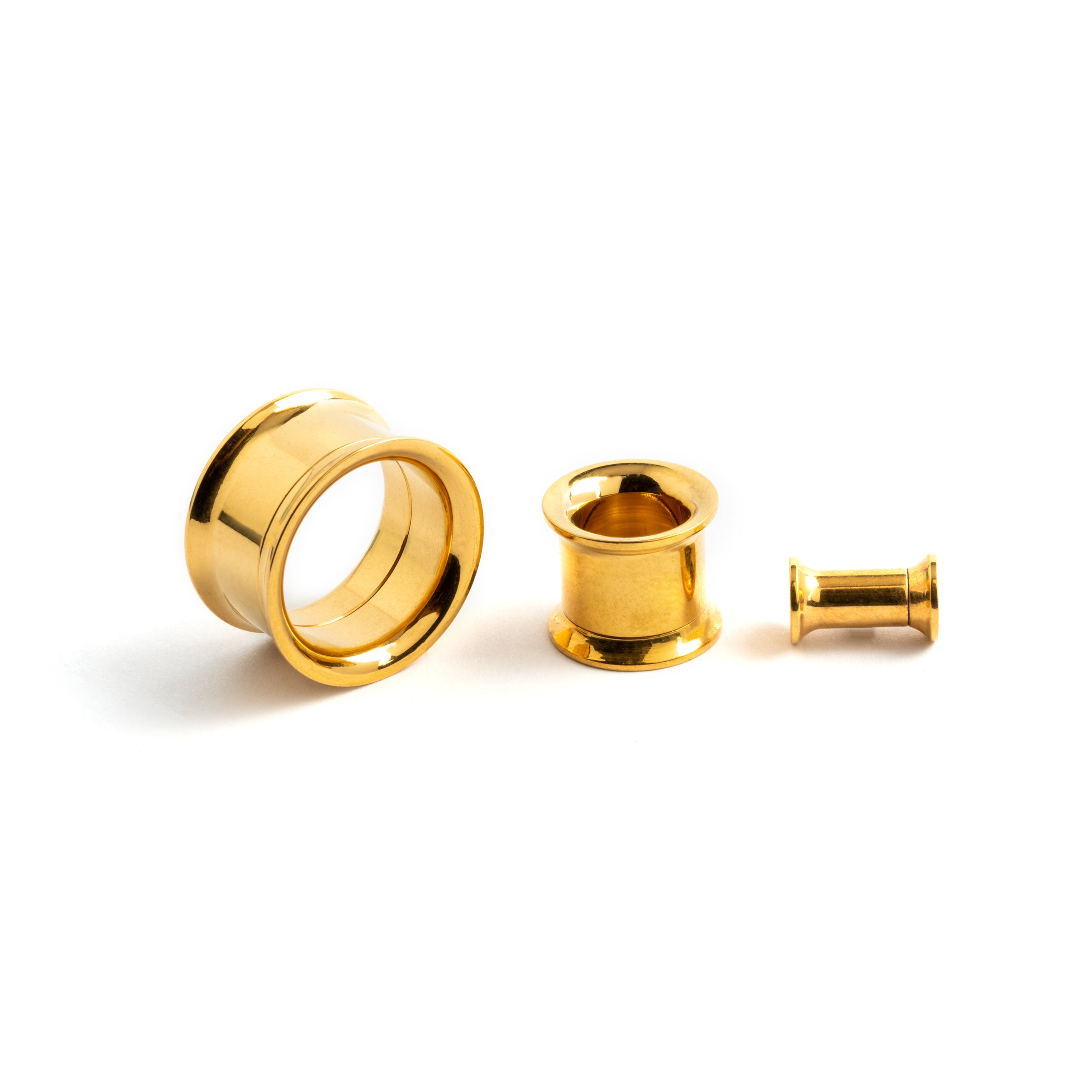 several sizes of gold surgical steel ear tunnels front and side view
