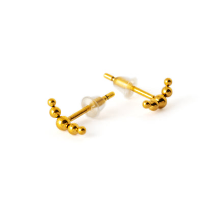 pair of Golden surgical steel spheres crescent shaped ear studs front and side view