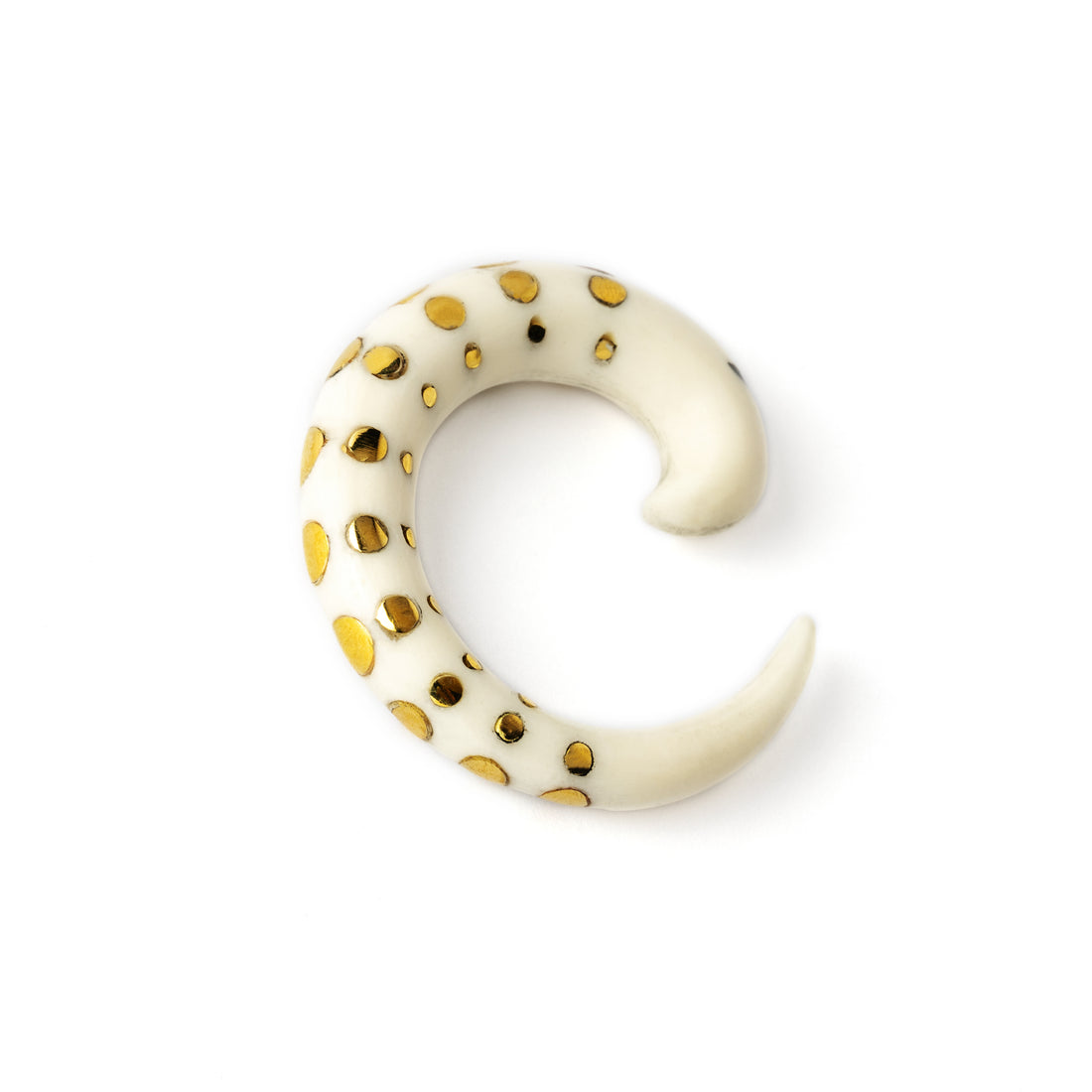 white bone taper ear stretcher with golden dots left side back view