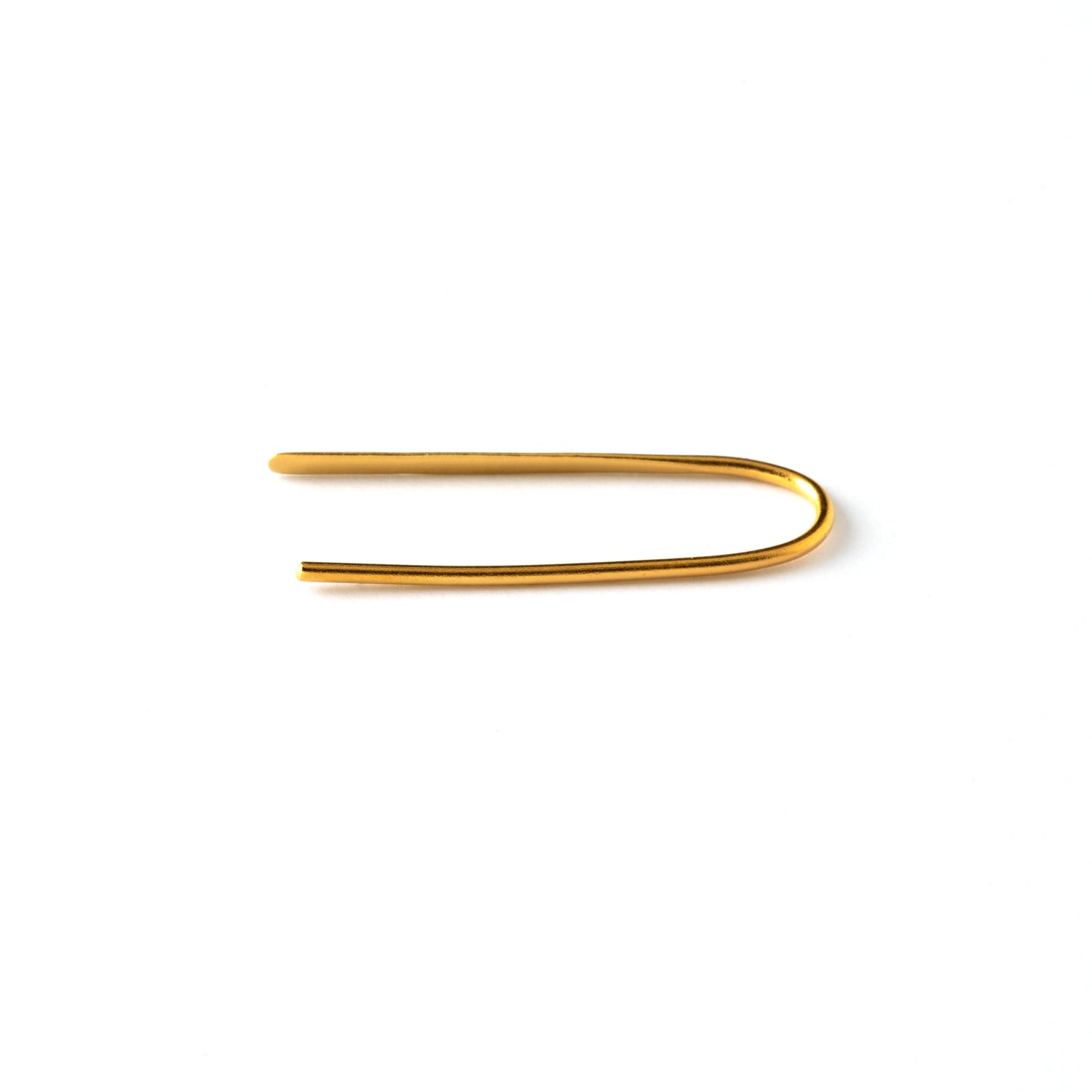 thin gold wire hook earrings shaped as an arc side close up view