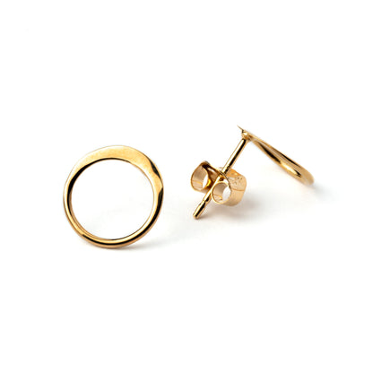 Gold circle ear studs front and side view