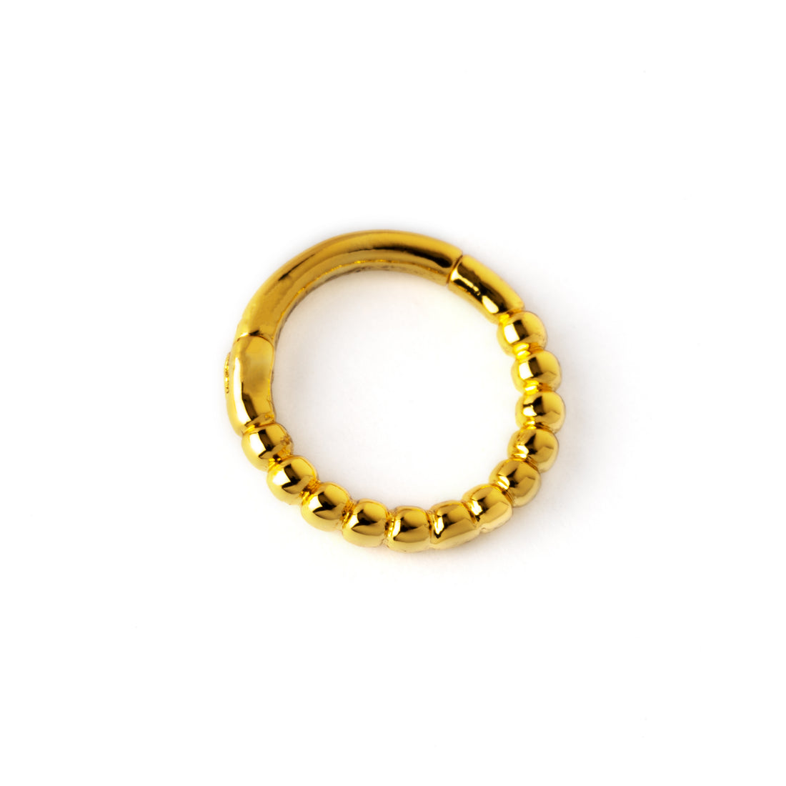 Golden surgical steel dotted piercing clicker ring side view