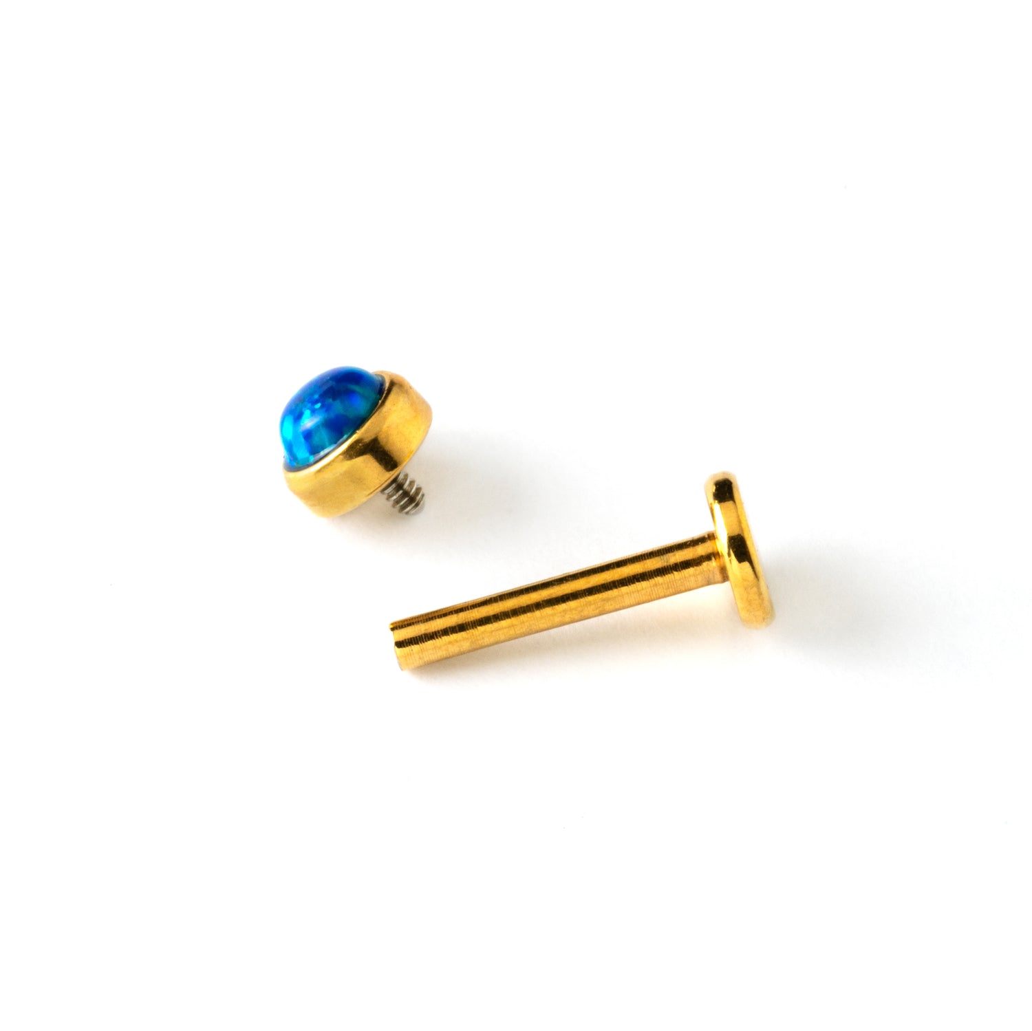 golden surgical steel internally threaded labret with blue opal stone closure view