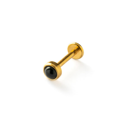 golden surgical steel internally threaded labret with black onyx stone left side view