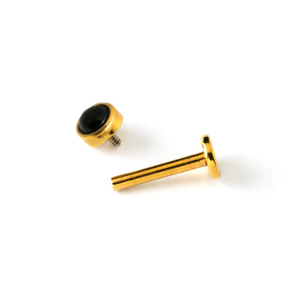 golden surgical steel internally threaded labret with black onyx stone closure view