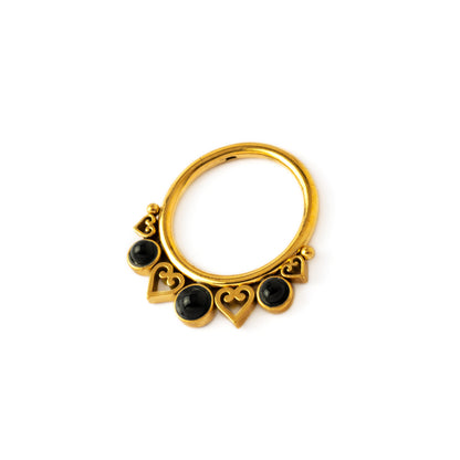 Golden Neptune Septum Clicker with black Onyx right side view