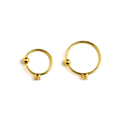 8mm and 10mm Gold nose rings with Crystal side view