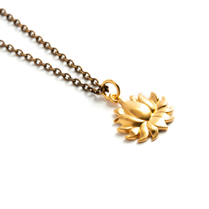 Petite Gold Lotus Charm necklace left side view