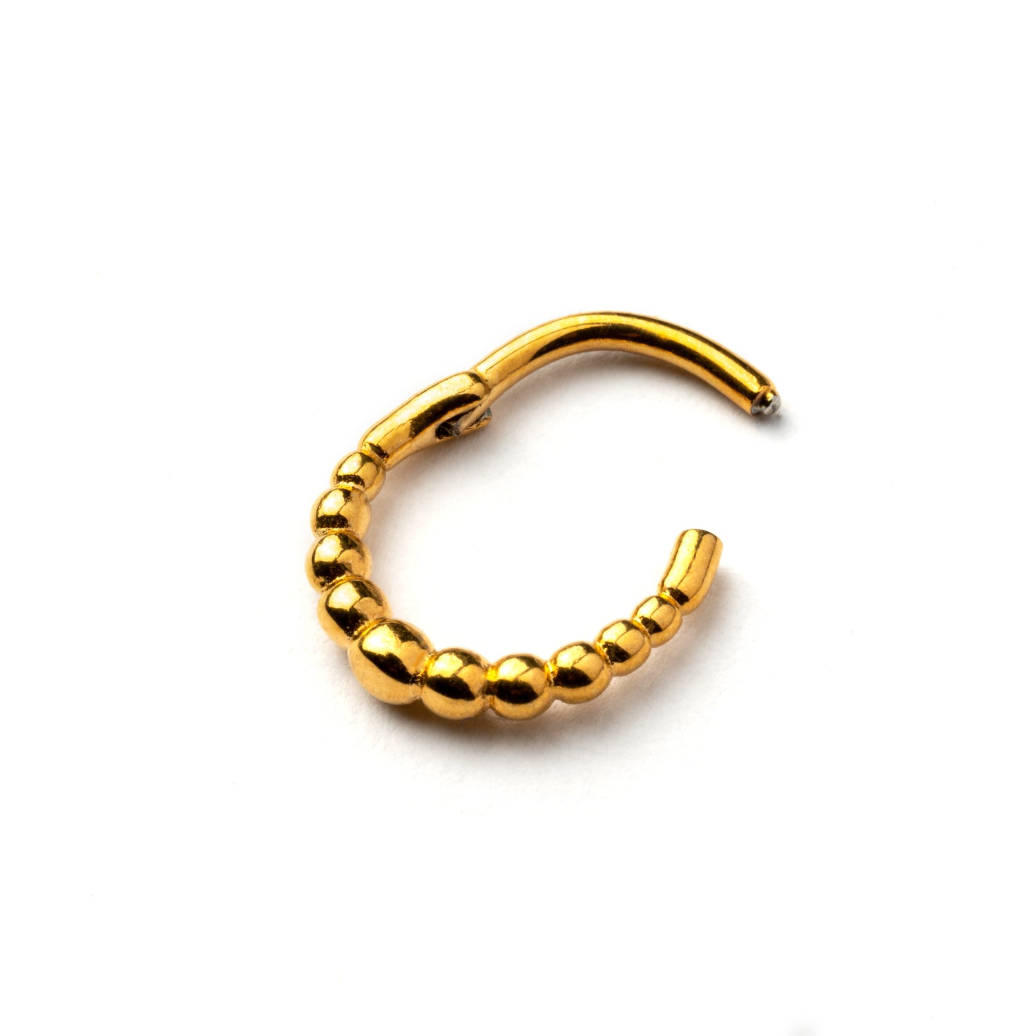 Golden surgical steel clicker piercing ring formed by tiny spheres hinged segment closure