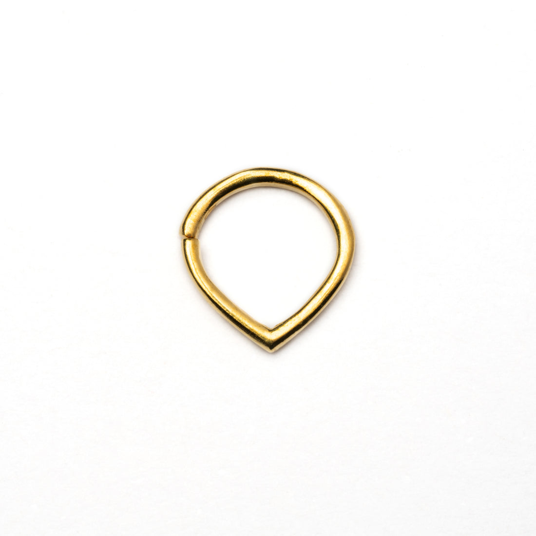 Golden teardrop septum ring frontal view