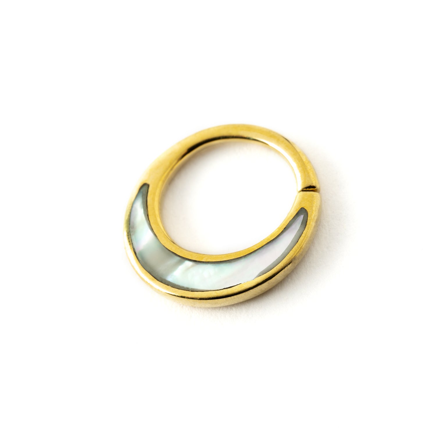 Golden brass septum piercing ring with mother of pearl inlay right side view
