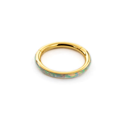 Gold surgical steel septum clicker ring with white opal inlay frontal view 