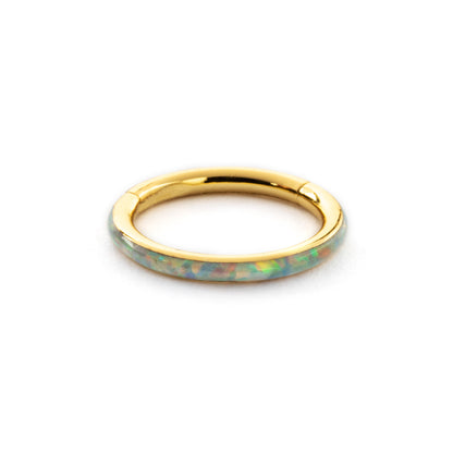 Gold surgical steel septum clicker ring with white opal inlay frontal view 