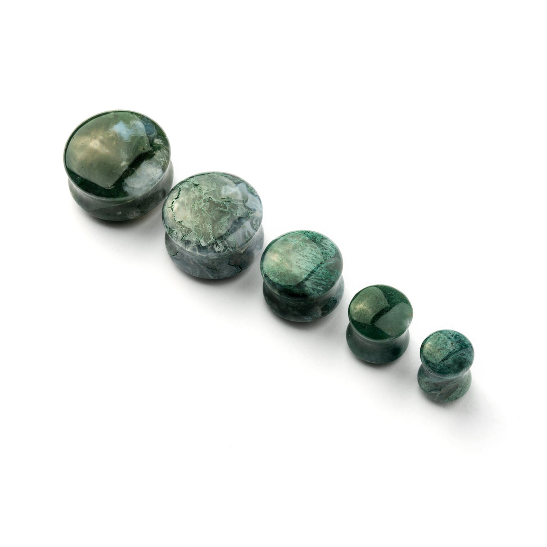 several sizes of African Green Jade double flare stone ear plugs front view