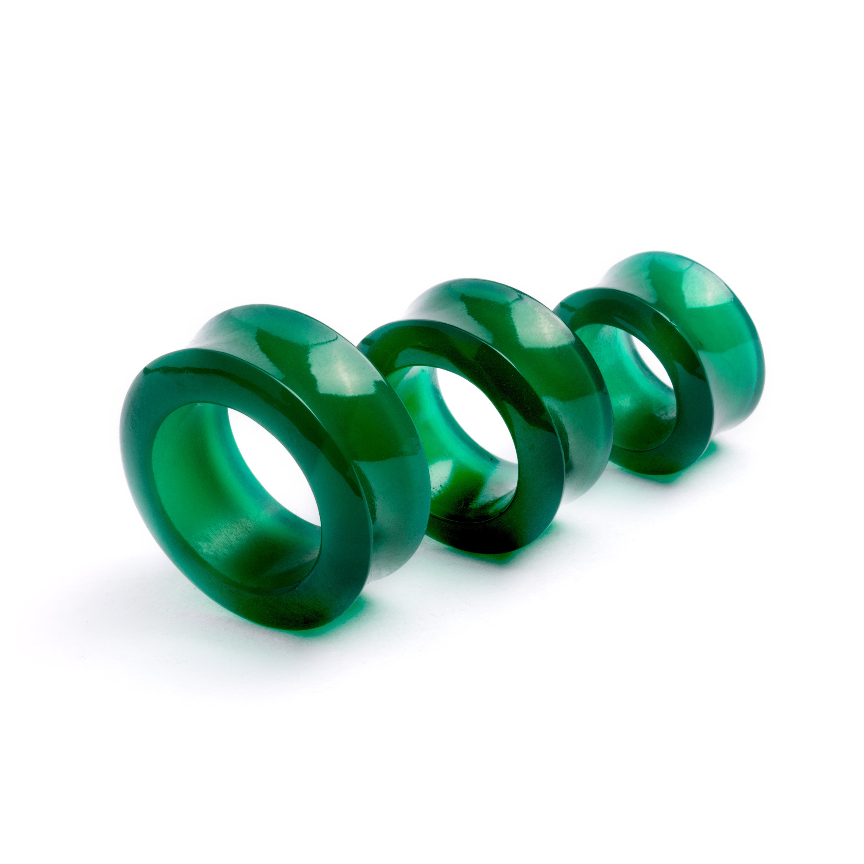 several sizes of green onyx double flare stone ear tunnels front view
