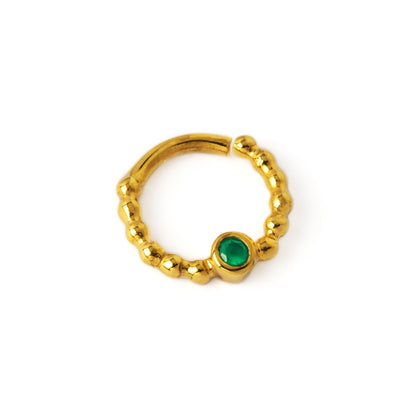 gold dotted septum ring with Emerald gemstone right side view