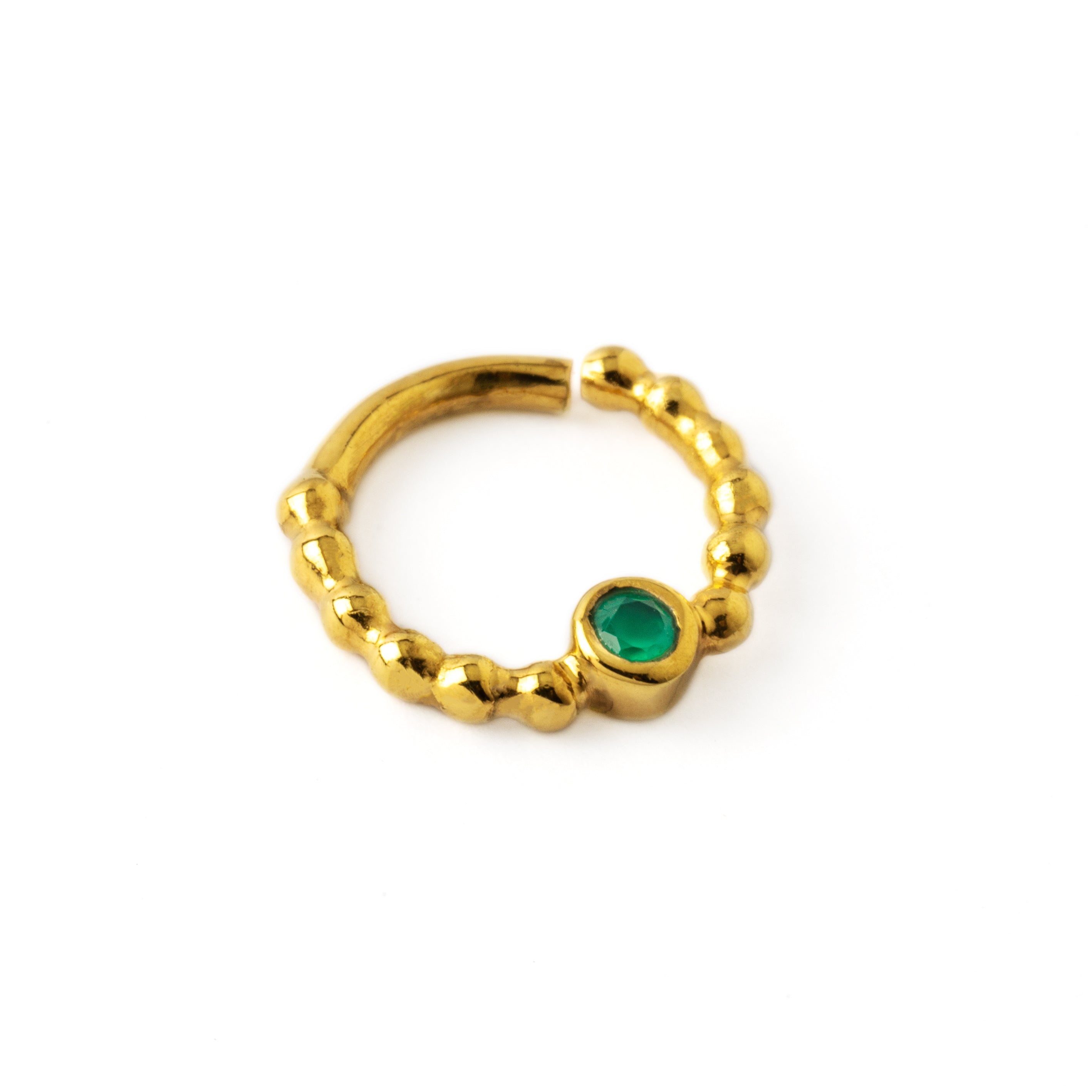 gold dotted septum ring with Emerald gemstone right side view