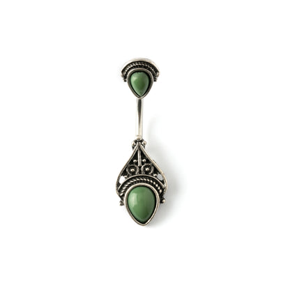 navel bar with silver toned goth ornament with two green stones one at the top and one at the bottom frontal view