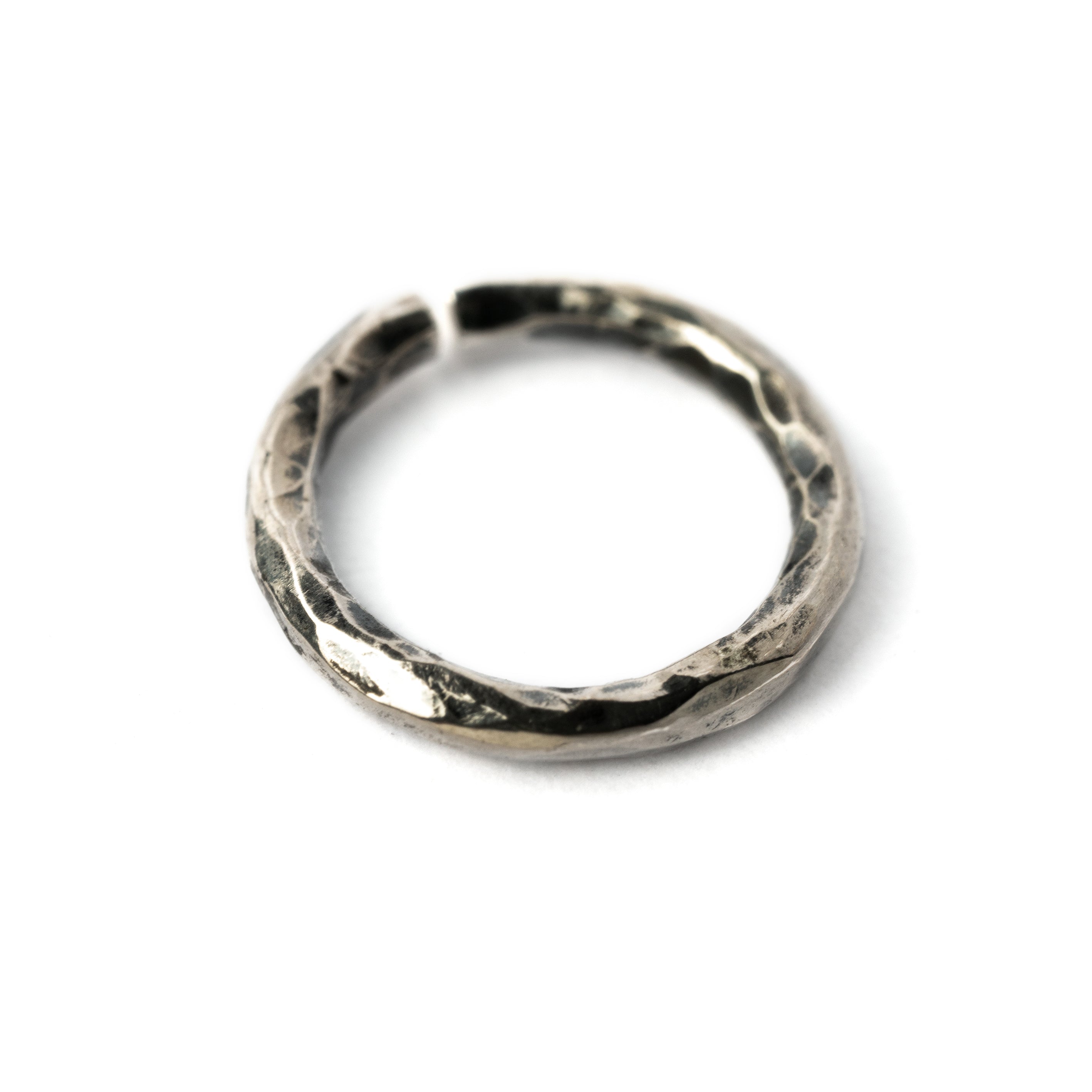 Hammered silver seamless piercing ring side view