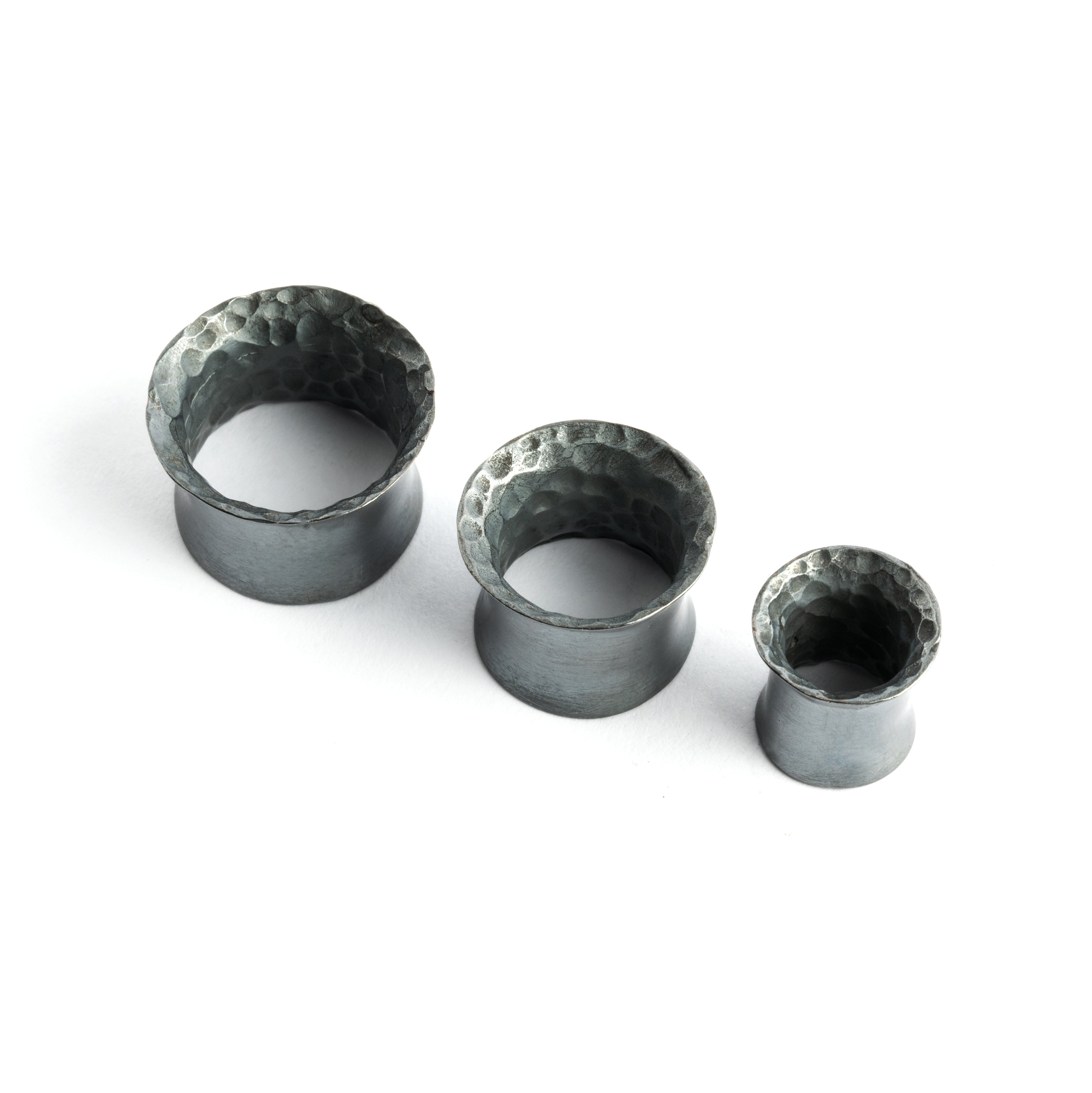 different sizes of Hammered Black Silver Ear Tunnel frontal view