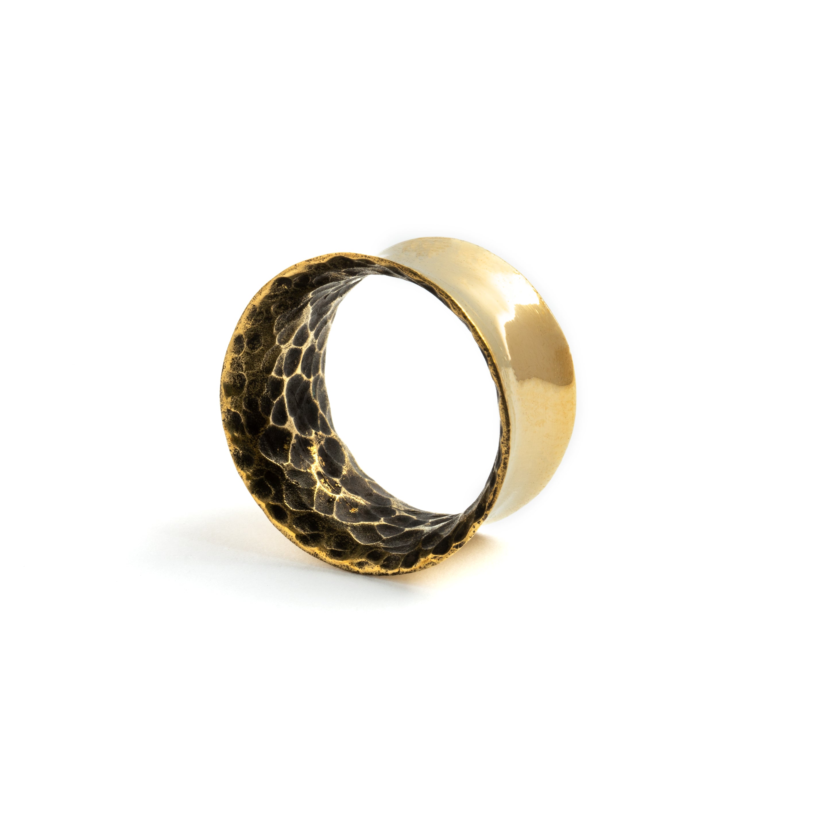 Hammered brass ear tunnels left side view