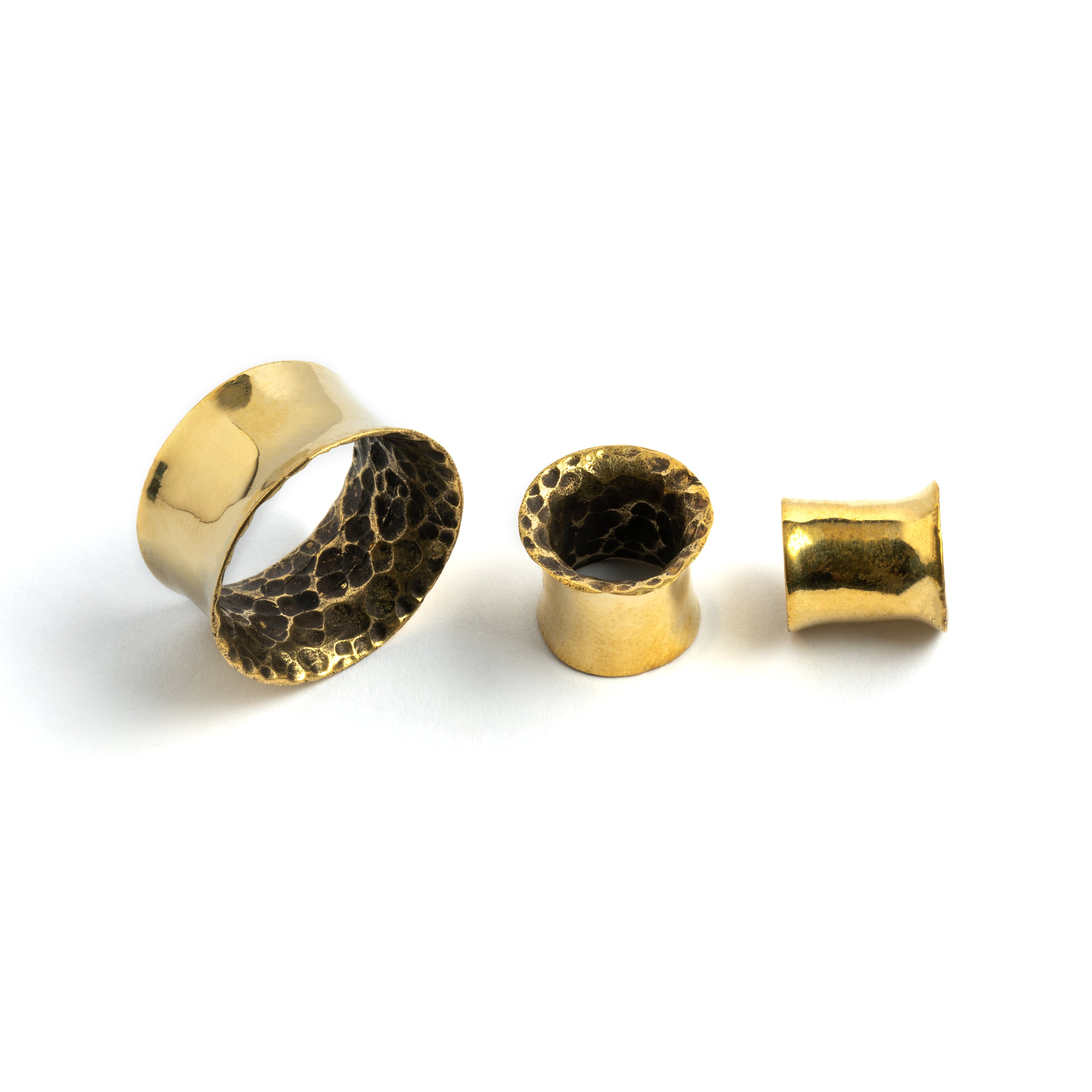 different sizes of Hammered brass ear tunnels