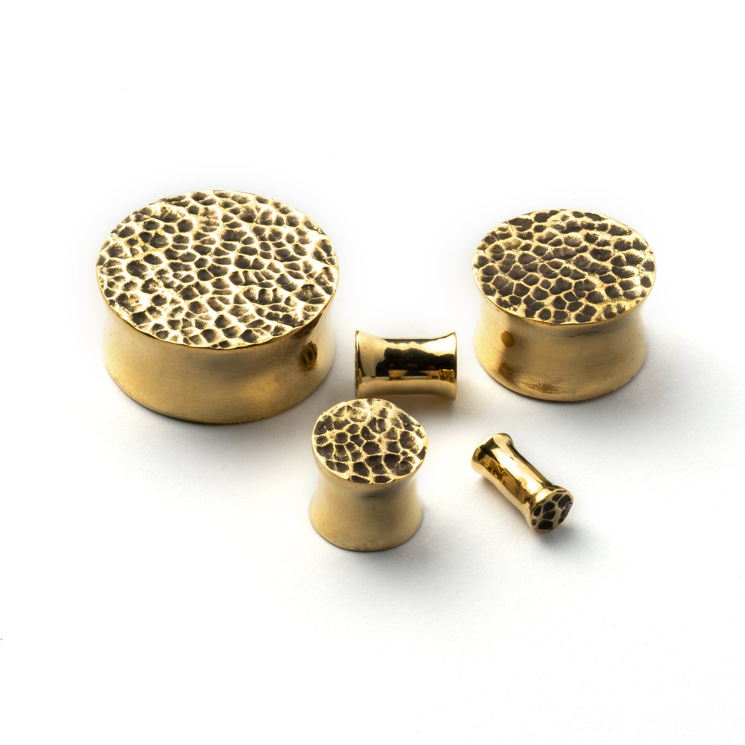 Hammered golden brass plug earrings