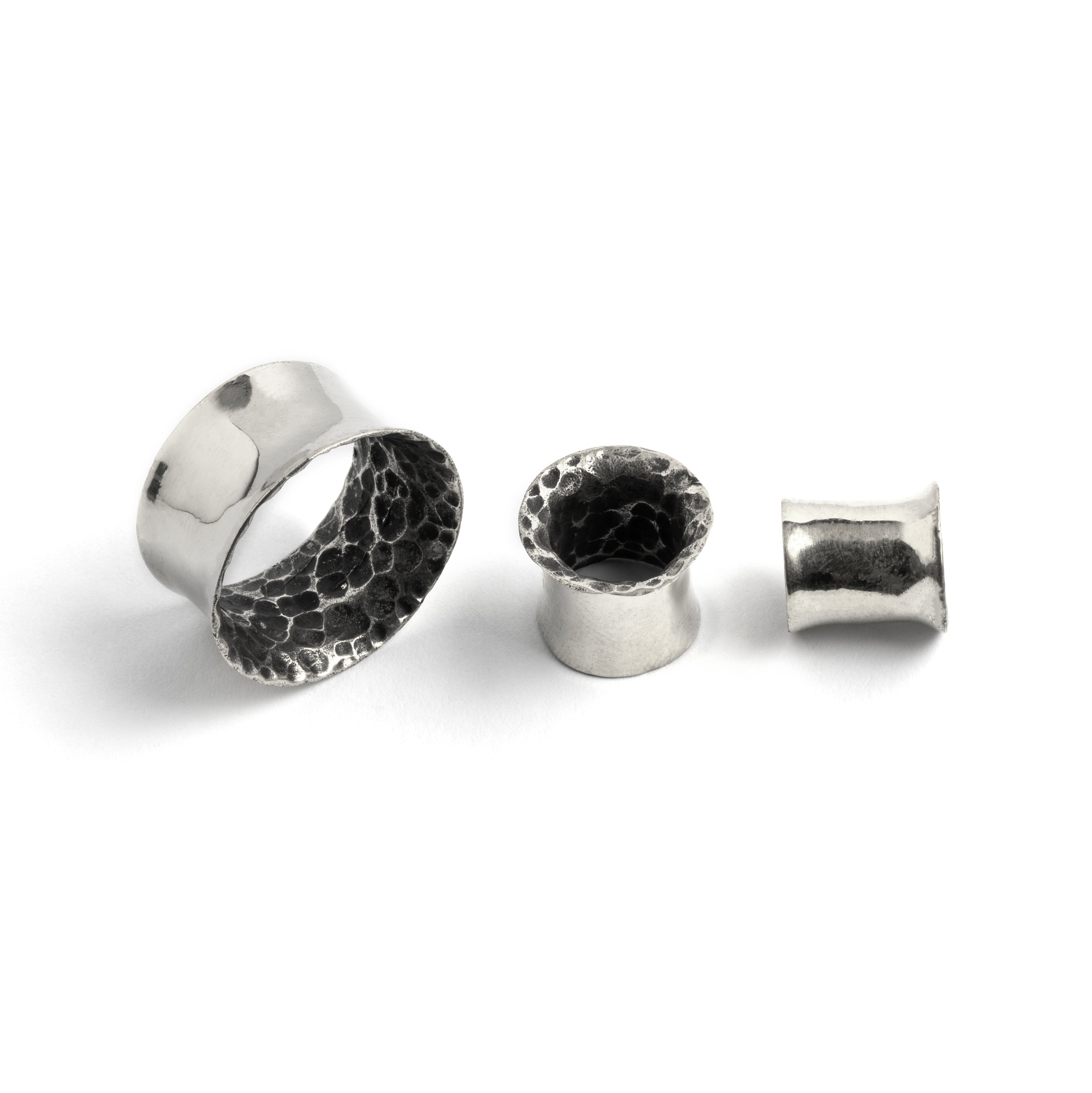 different sizes of Hammered Silver ear tunnels above view