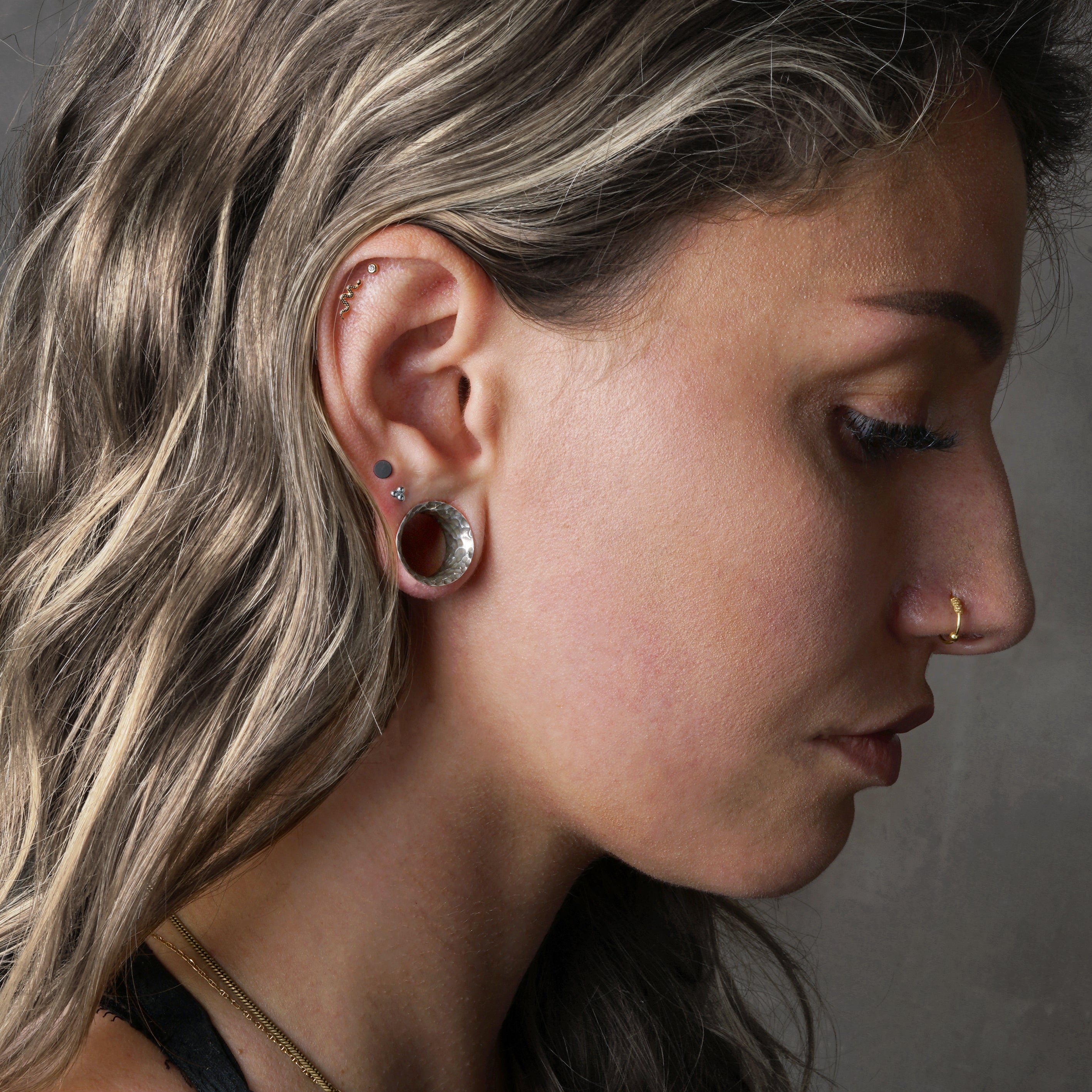 model wearing Hammered Silver Tunnels