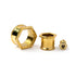several sizes of golden brass hexagon ear tunnels front and side 