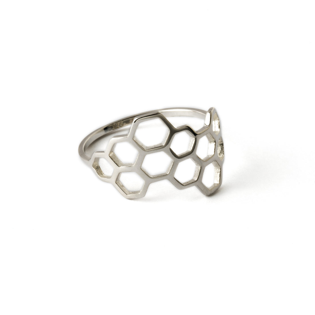 silver ring with honeycomb outlines right side view