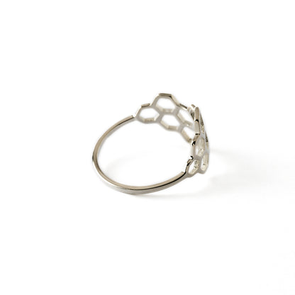 silver ring with honeycomb outlines back left view