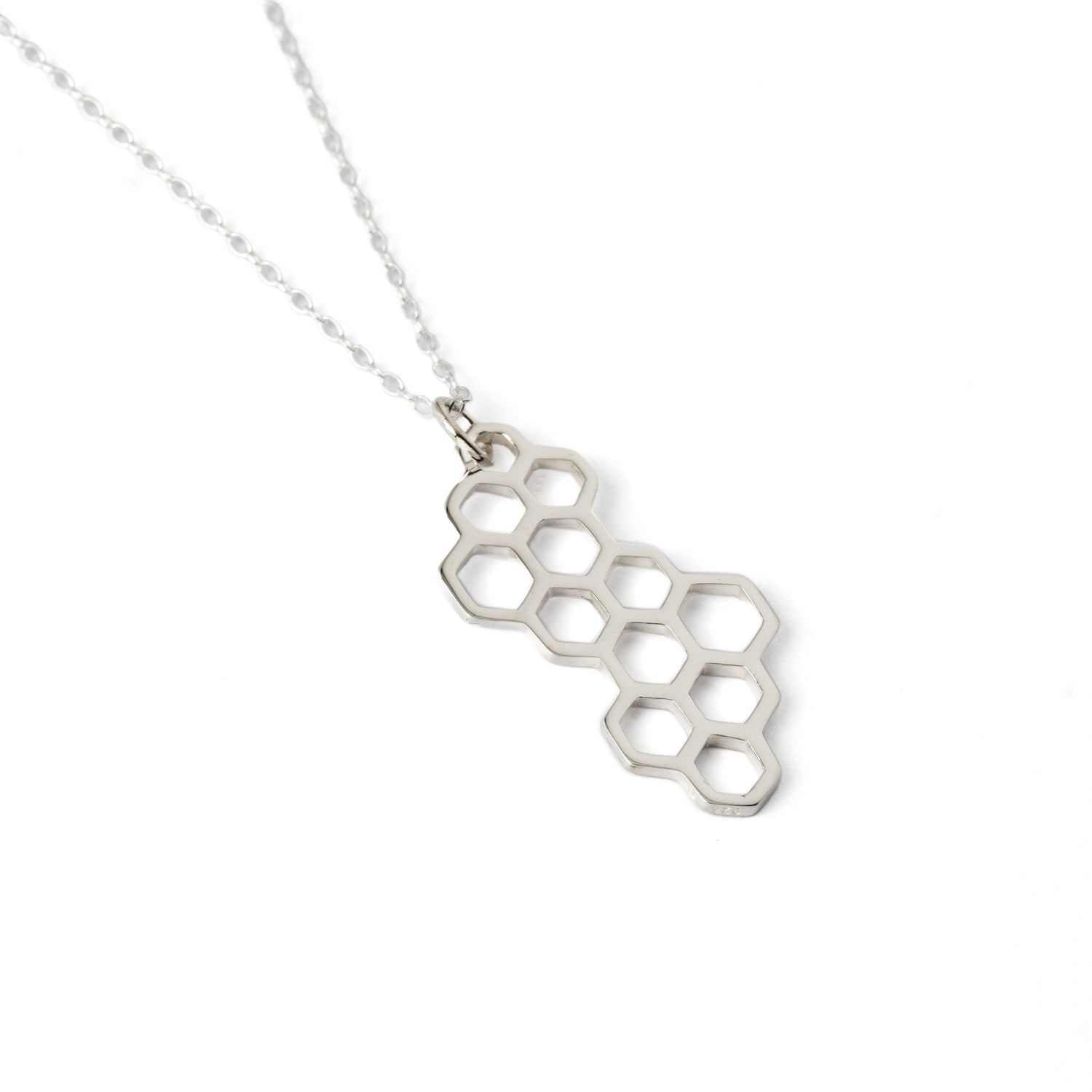 Honeycomb silver pendant necklace left side view
