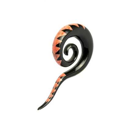 single spiral long hook ear stretcher with pattern of coral inlay triangles left side view