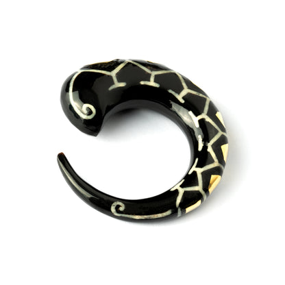 single horn ear stretcher with brass hexagons, curved hook shaped side view