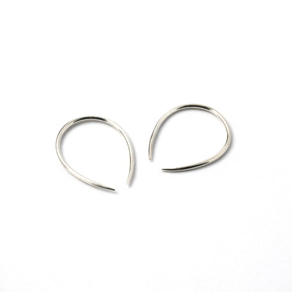 pair of 1mm silver wire horseshoe earrings side view