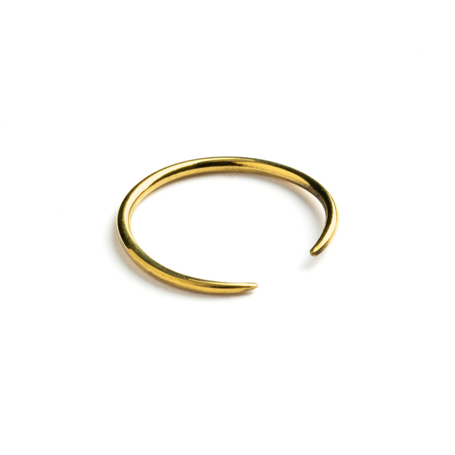 single golden brass wire horseshoe earring left side view