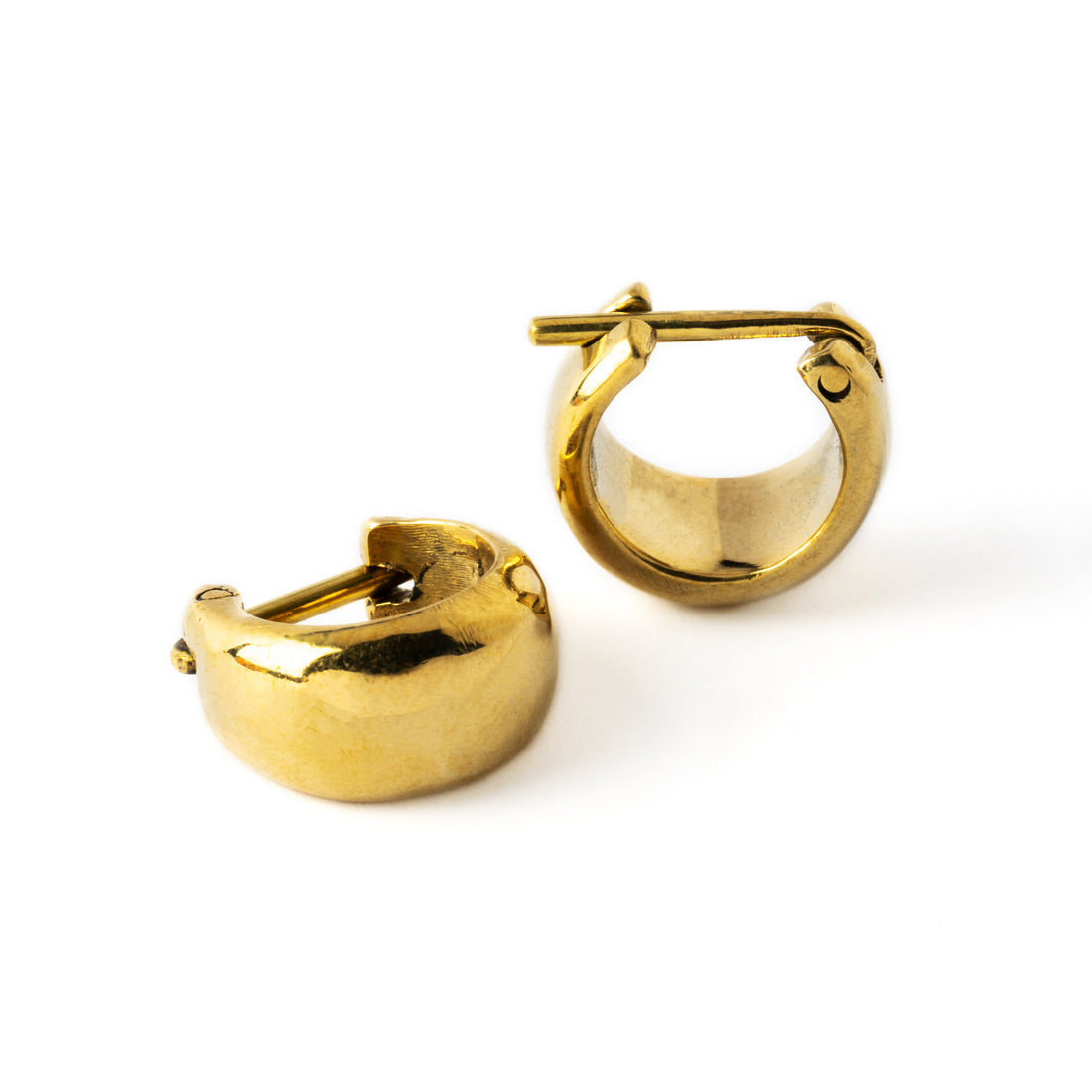 Indios golden chunky small hoop earrings side and down view