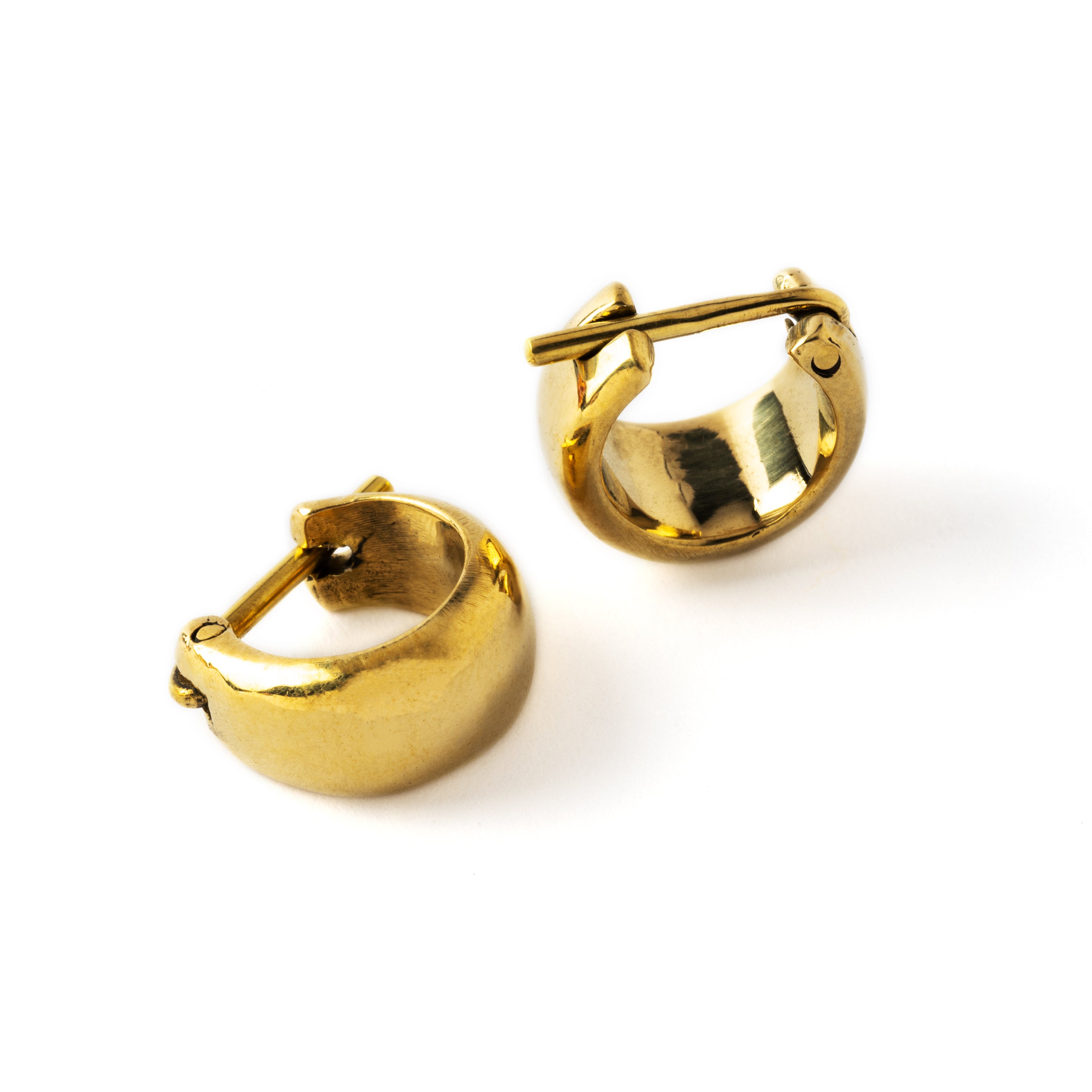Indios golden chunky small hoop earrings side and down view