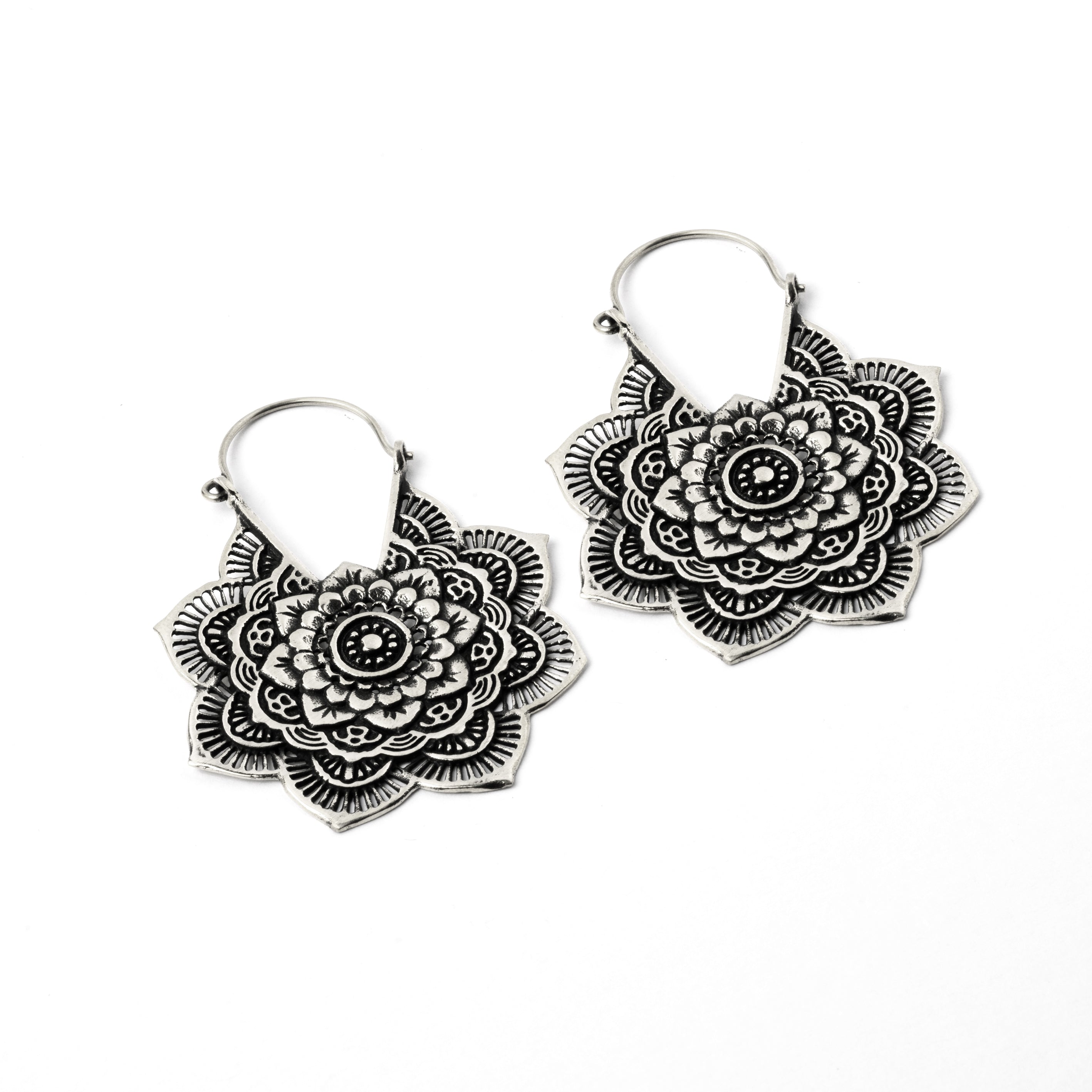 pair of white brass carved layered flower mandala earrings left side view