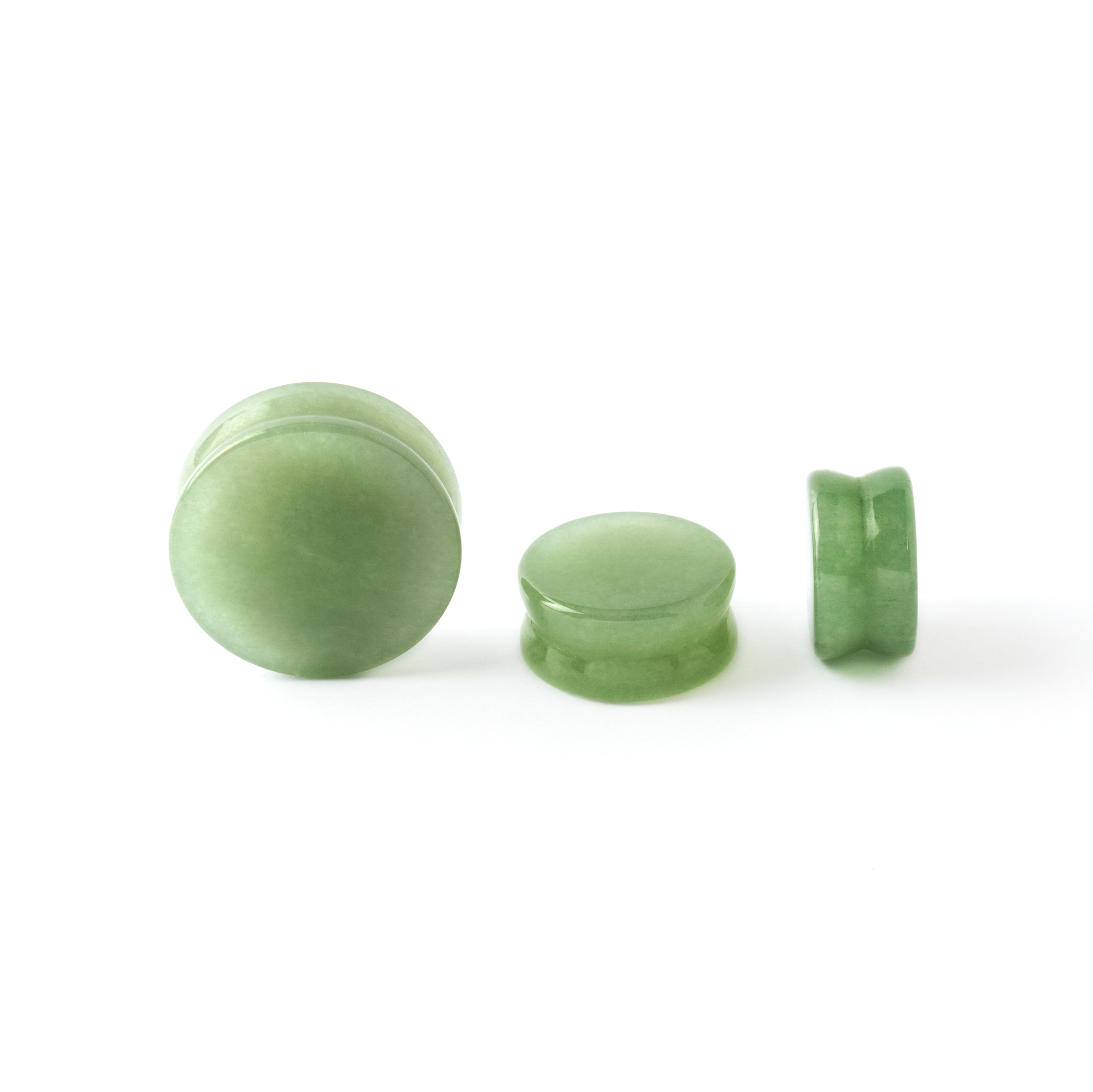 different sizes light Jade stone plug front and side view